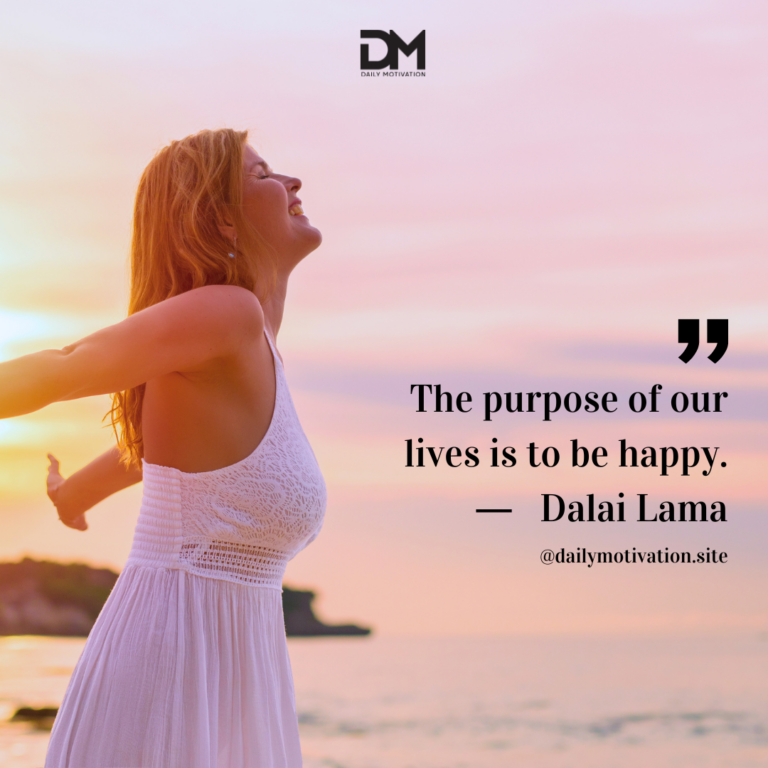 A woman in a white dress throws her arms out towards the pink sunset.