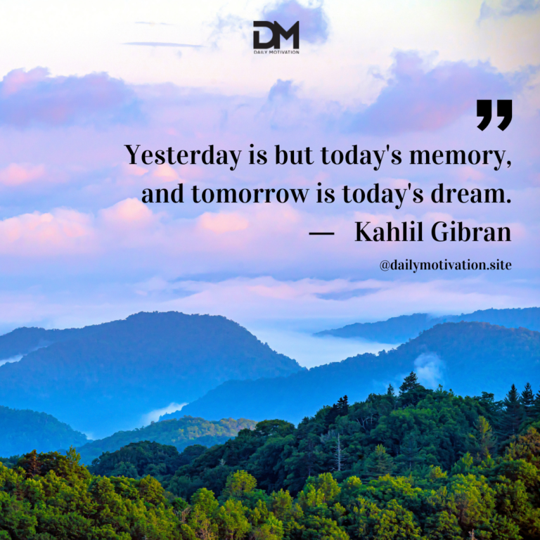 A light purple sky above a range of mountains and green forest.