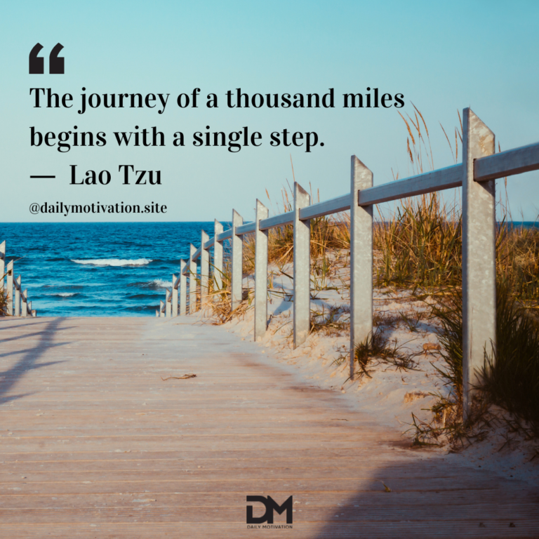 A wooden staircase leading to a blue sea in the distance.