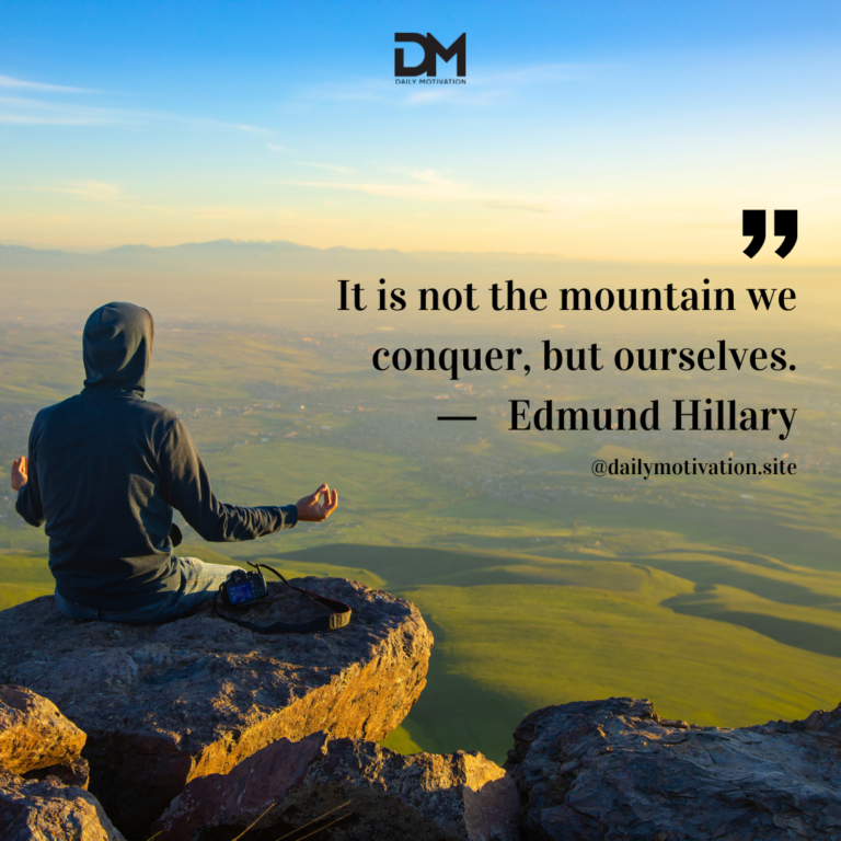A person sits in lotus position on top of a high cliff, overlooking the land far below.