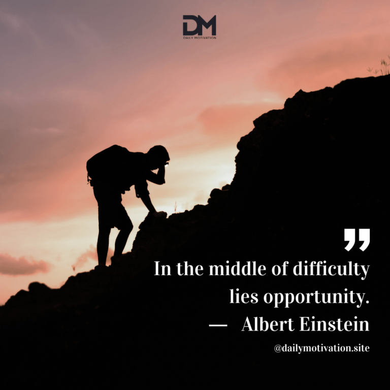 A silhouetted person wearing a backpack rests as they climb a cliff with the red sunset behind them.