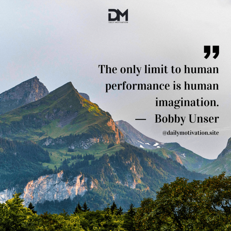 A far away green and grey mountain looms over a forest.