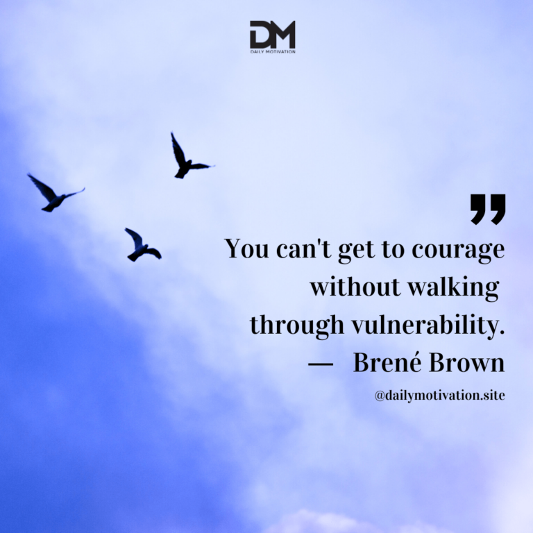 Three black birds fly high in a bright blue sky.