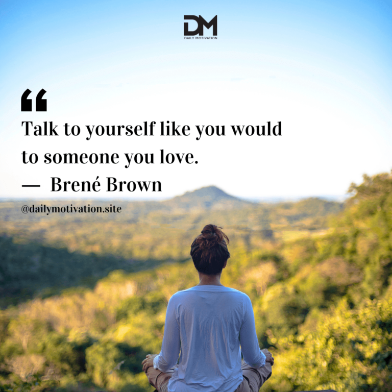A woman in a white shirt sits in lotus position looking out at a golden green forest.