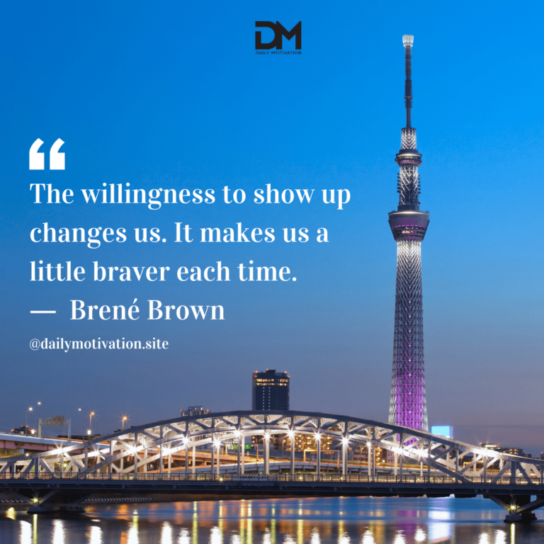 A dark blue night sky overlooking a well lit bridge and tall skyscraper.