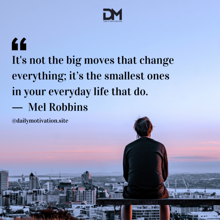 A man sits on a high ledge overlooking the cityscape beyond at sunset.