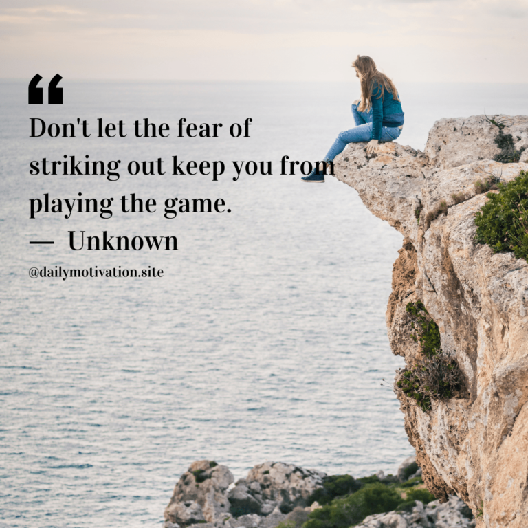 A woman sits on top of a high cliff, both overlooking the water far below.