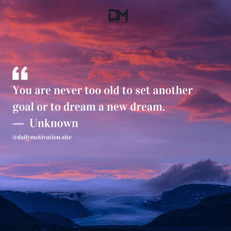 A purple and pink sky at sunset over the mountains.