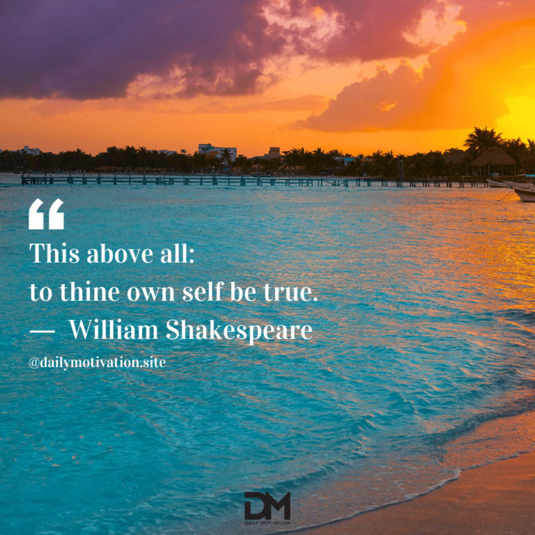 A vibrant purple and orange sky above a blue-green sea at sunset.