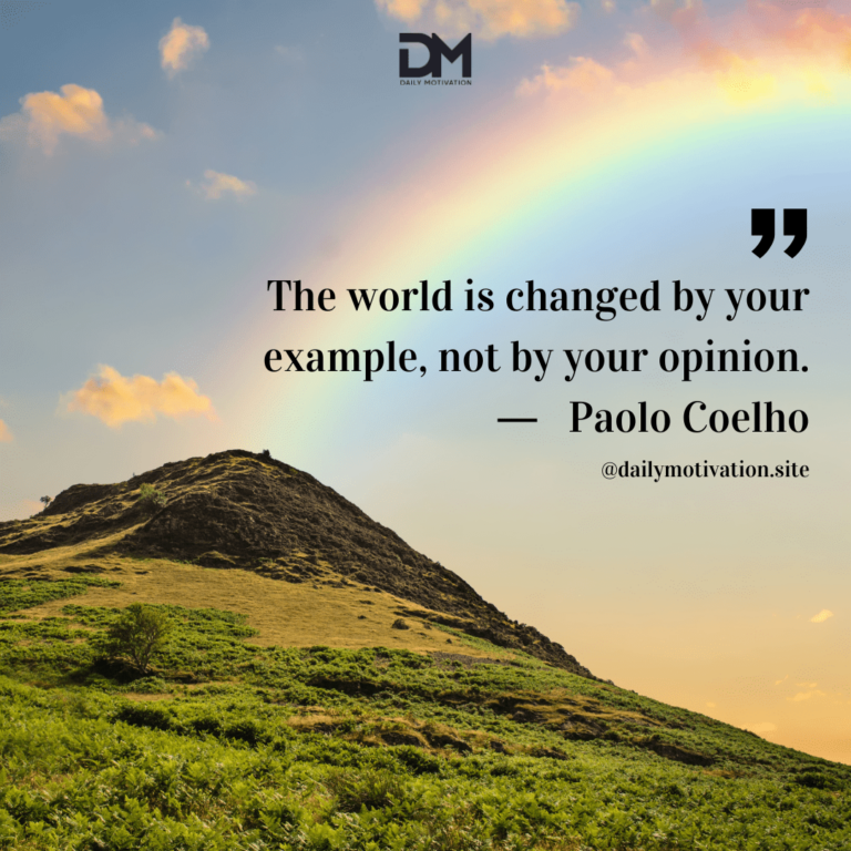 A brightly colored rainbow stretches across the sky above a rocky cliff.