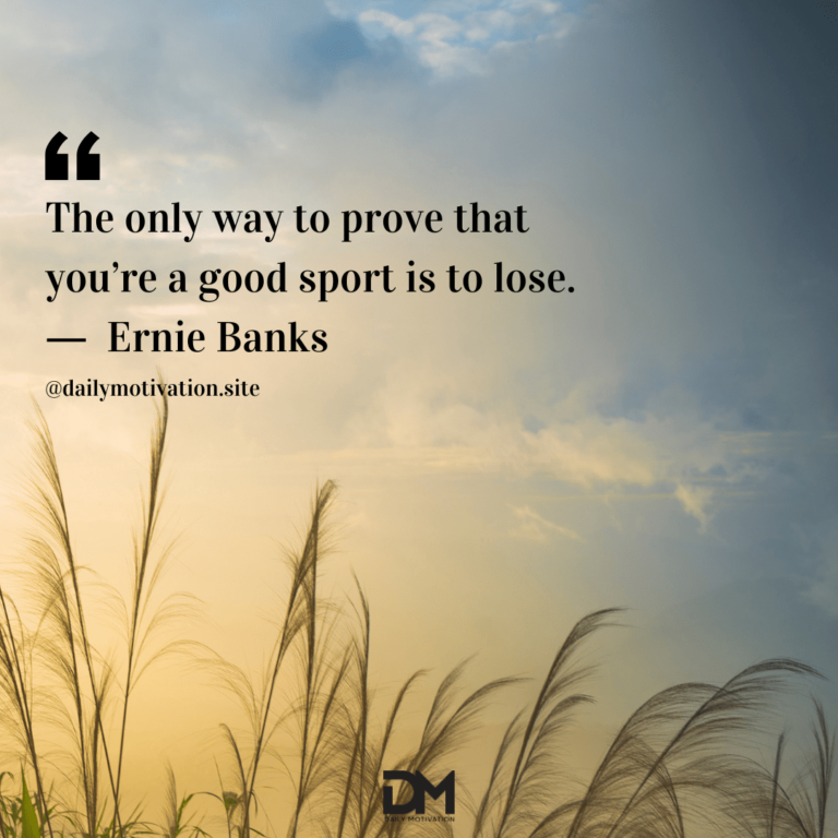 A light yellow and blue sky above a field of tall grass. Text reads: The only way to prove that you're a good sport is to lose. - Ernie Banks
