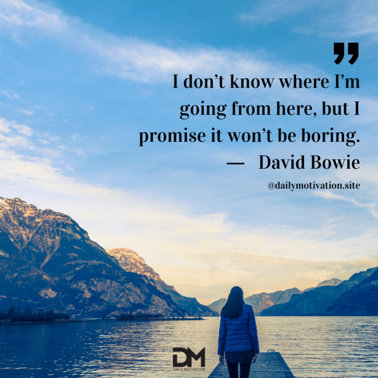 Person stands on a dock looking out at a huge lake and cliffs beyond. Text reads: I don't know where I'm going from here, but I promise it won't be boring. - David Bowie