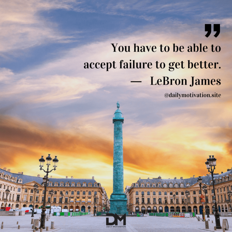 A pink and orange sunset behind Trafalgar Square, London