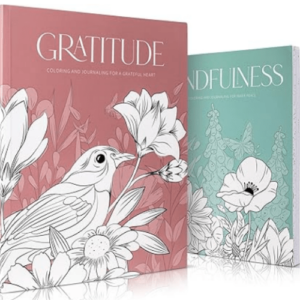 Two adult coloring books, one pink, one green.