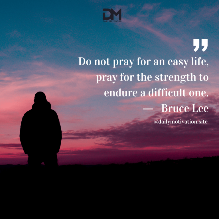 Man stands in shadows, looking at a dark purple and blue sky.