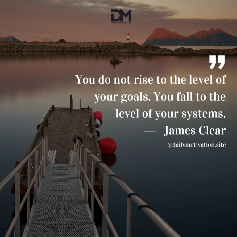 A darkening sky above a pier, with the water and mountains far in the distance.