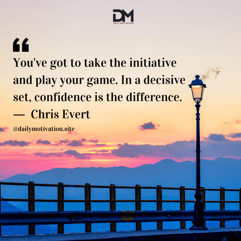 A beautiful yellow and pink sunset along a metal fence and streetlamp.