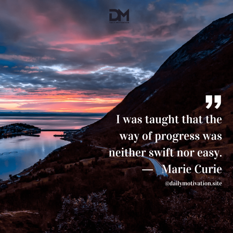 A road along a dark cliff with a a dark pink and blue cloudy sky.