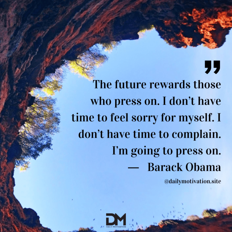 View of a blue sky from inside a rocky cavern.
