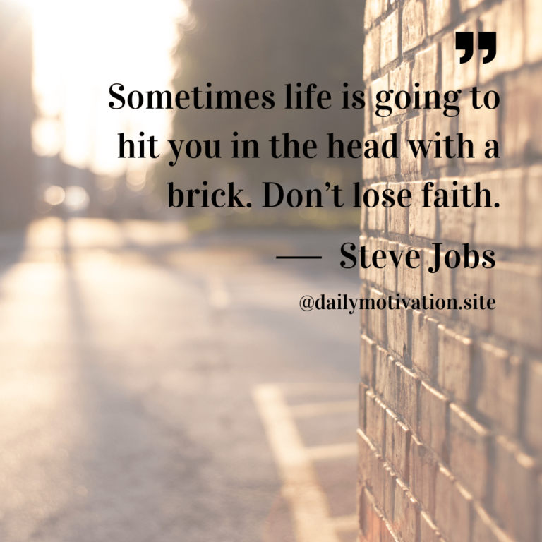 A brick wall in an alley.