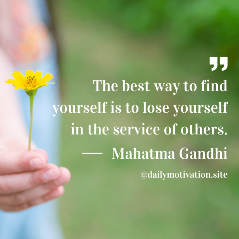 Child's hand holds out a yellow flower.