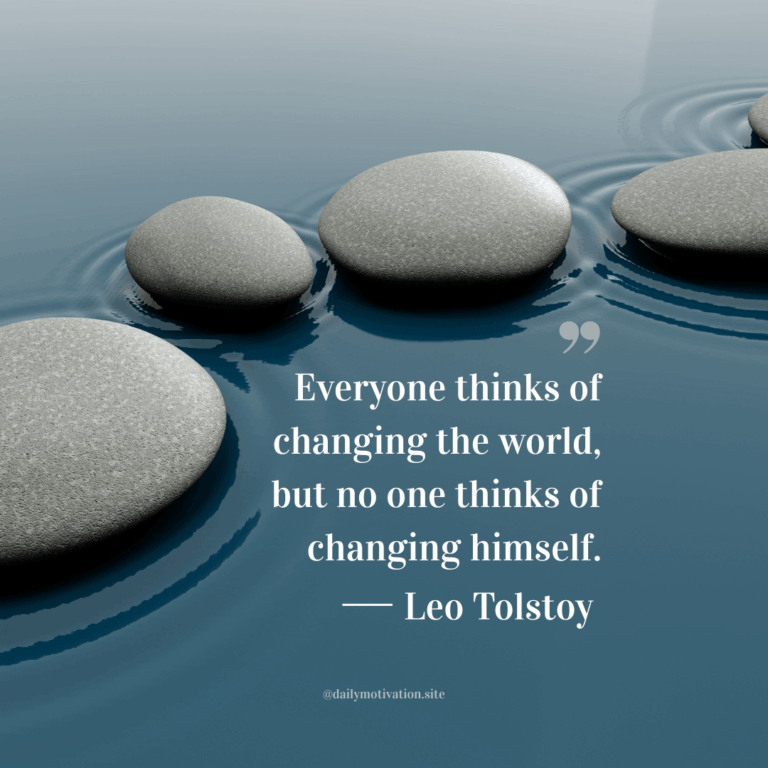 Four flat stones on a calm sheet of water.