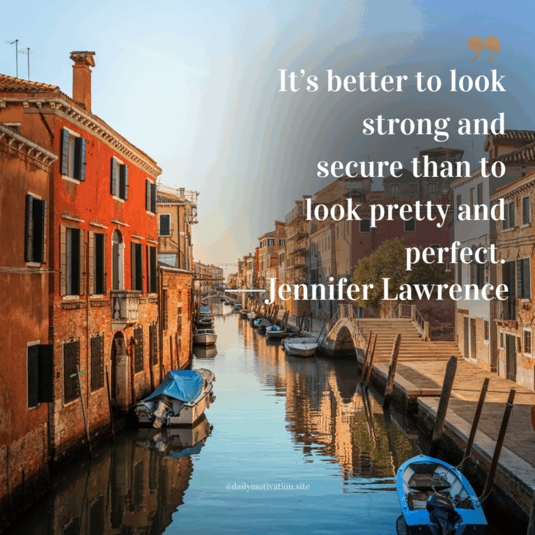 A calm canal between colorful buildings.