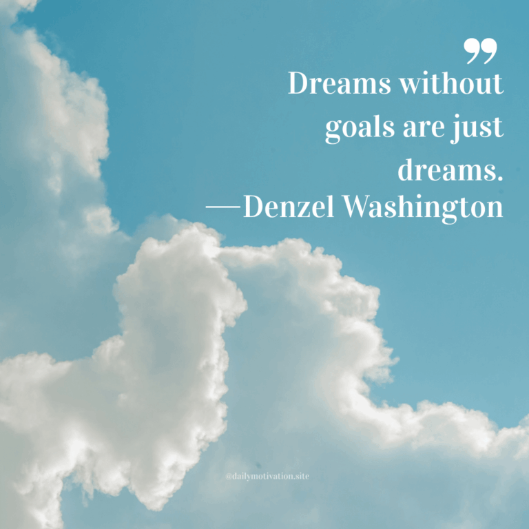 A blue sky with grey clouds floating.