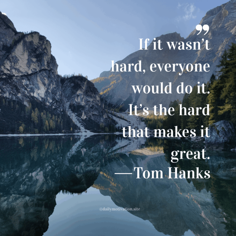 Mountains are mirror-reflected in the lake below.