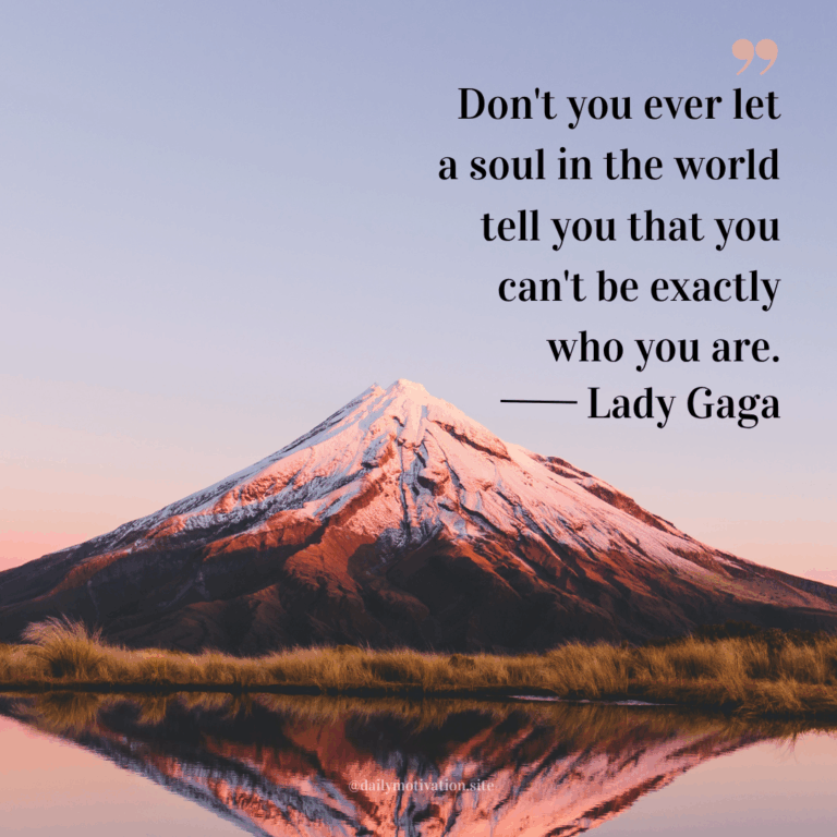 A snow-topped Mount Fuji is reflected in the still water below.