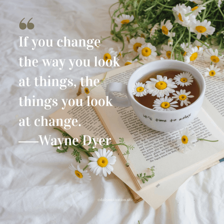 Bowlful of daisies sitting on a book.