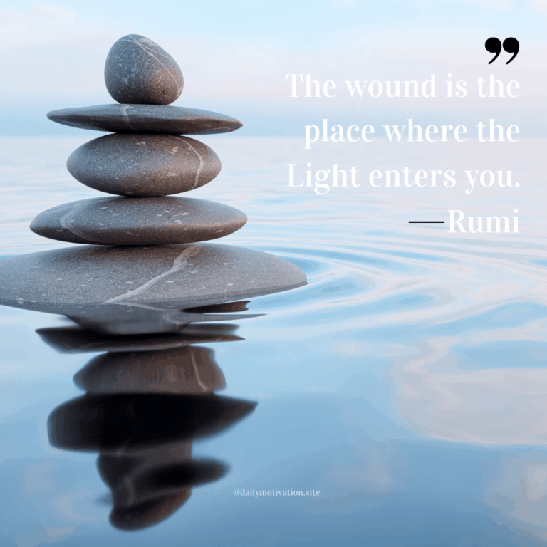 A stack of smooth rocks in a pond of still water.