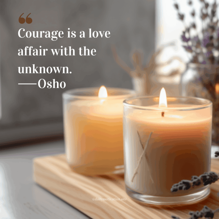 Two caramel-colored candles burning in a clear jars on a wooden stand.