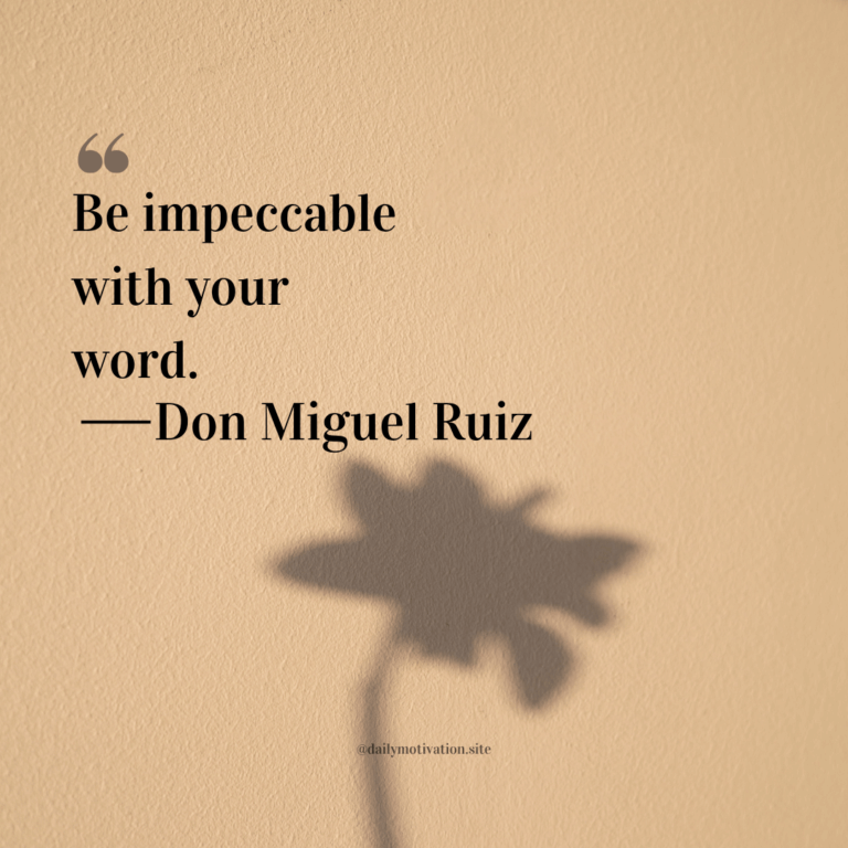 Shadow of a flower against a beige wall.