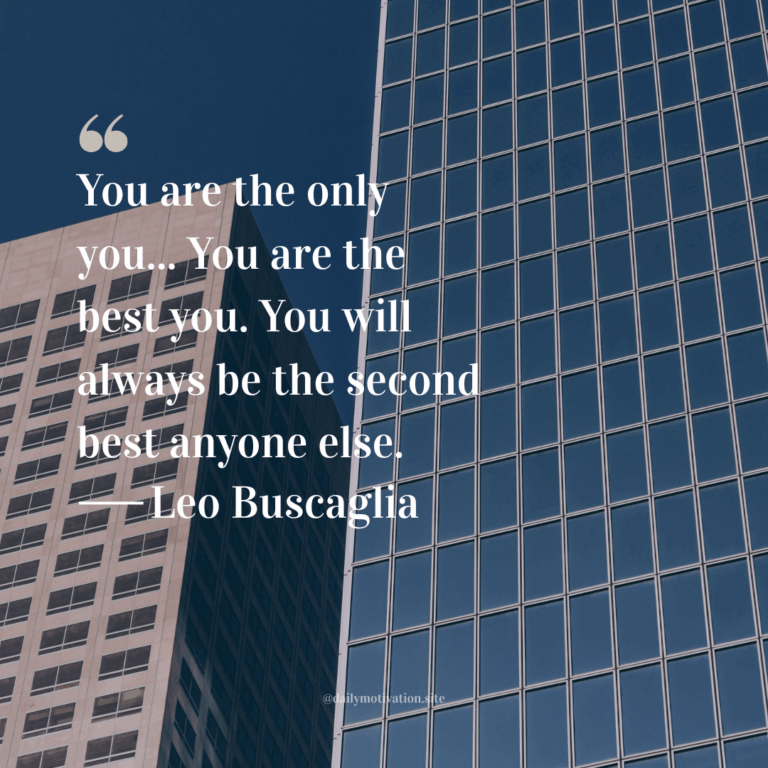 Modern skyscrapers with reflective glass windows under a blue sky.