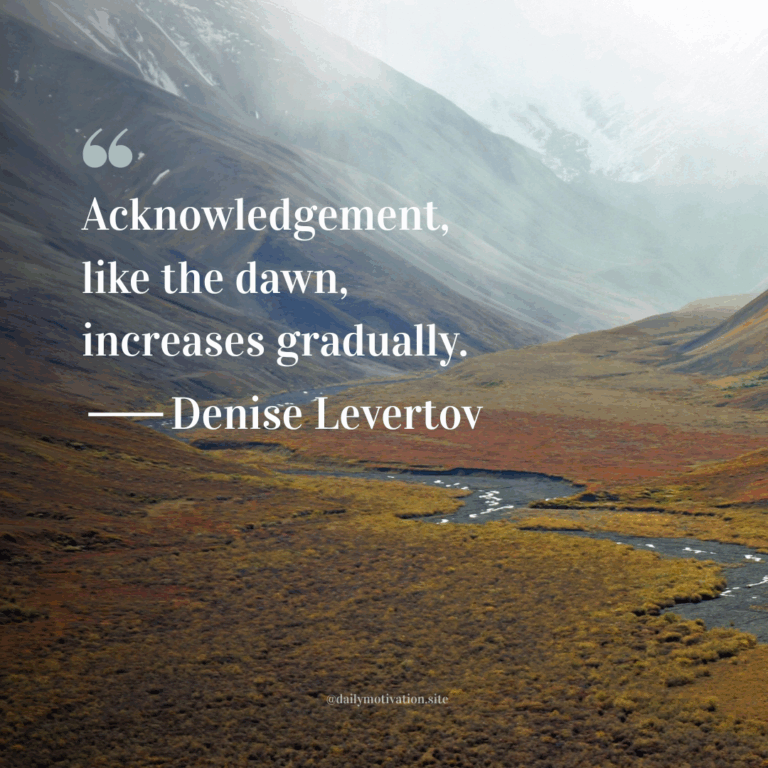 Misty mountain valley with a winding river and autumn-colored landscape.
