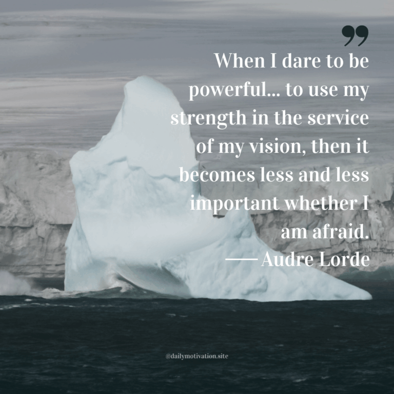 A gigantic iceberg sits in dark water.