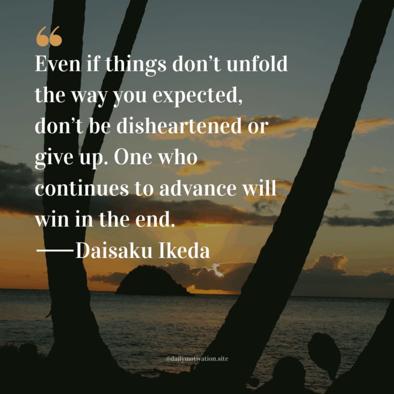 A view of an island in the distance at sunset.