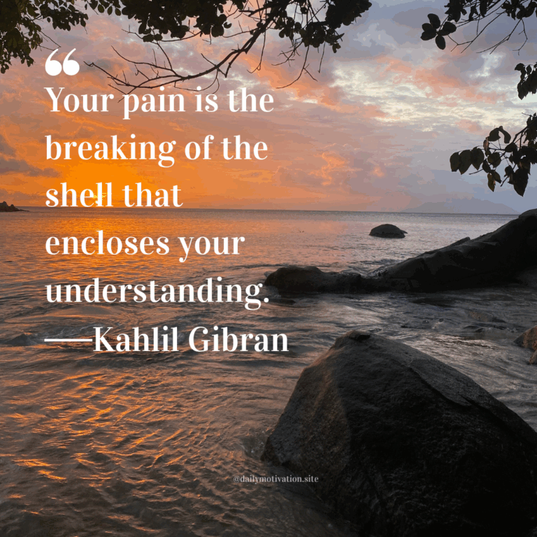 Vibrant sunset over the ocean with rocks and trees framing the shoreline.