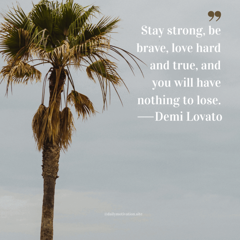 Tall palm tree against a cloudy sky.