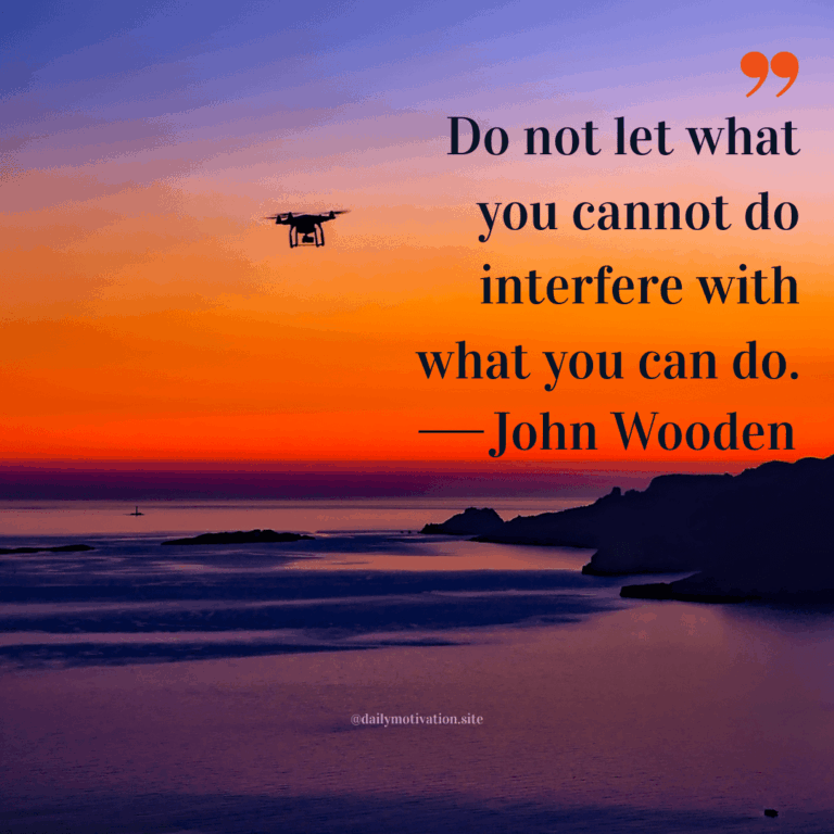 A darkening orange sky on a beach.