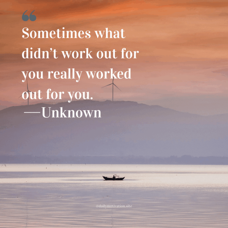 Small fishing boat on calm water under a pink and orange sky with distant mountains.