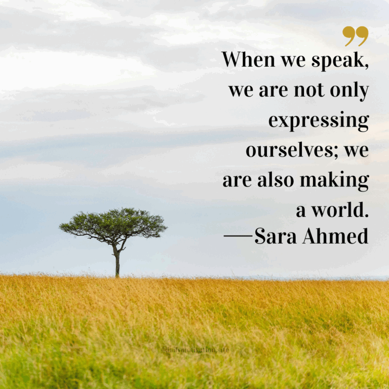 Lone tree standing in a golden field beneath a cloudy sky.