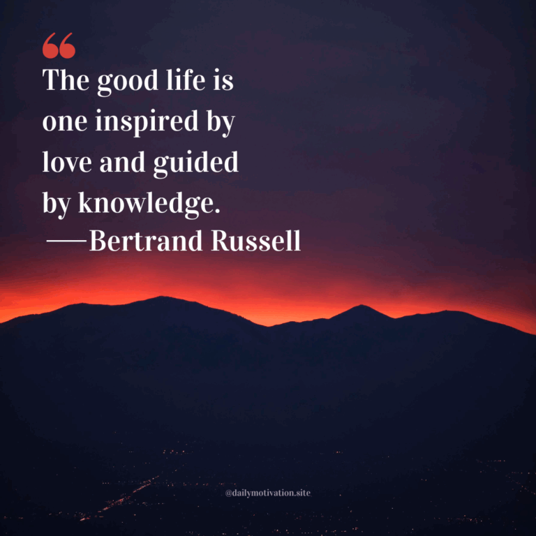 Dark mountain silhouette beneath a deep purple and red sunset sky.