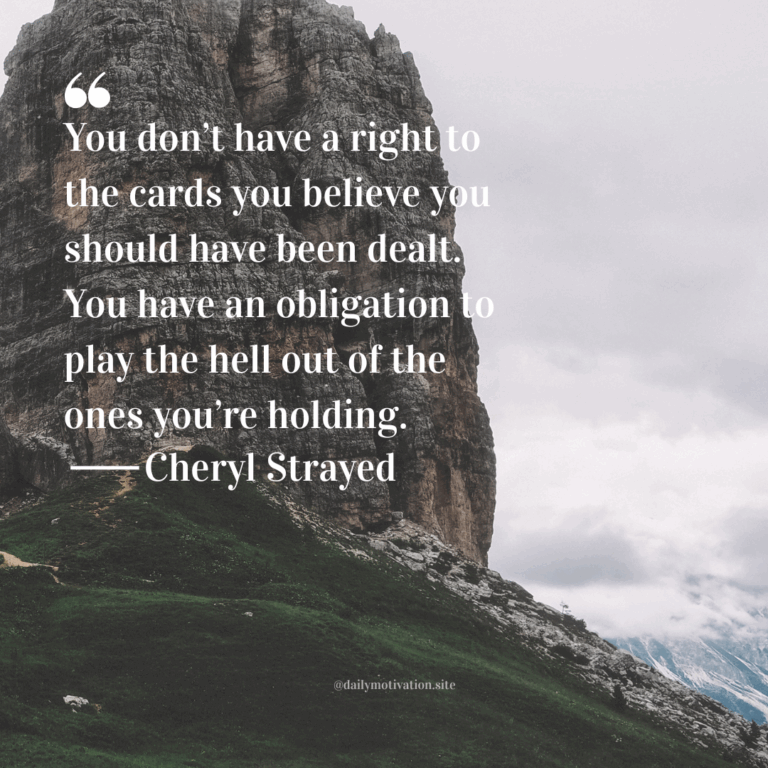 Towering rocky mountain peak rising above green grassy slopes under a cloudy sky.