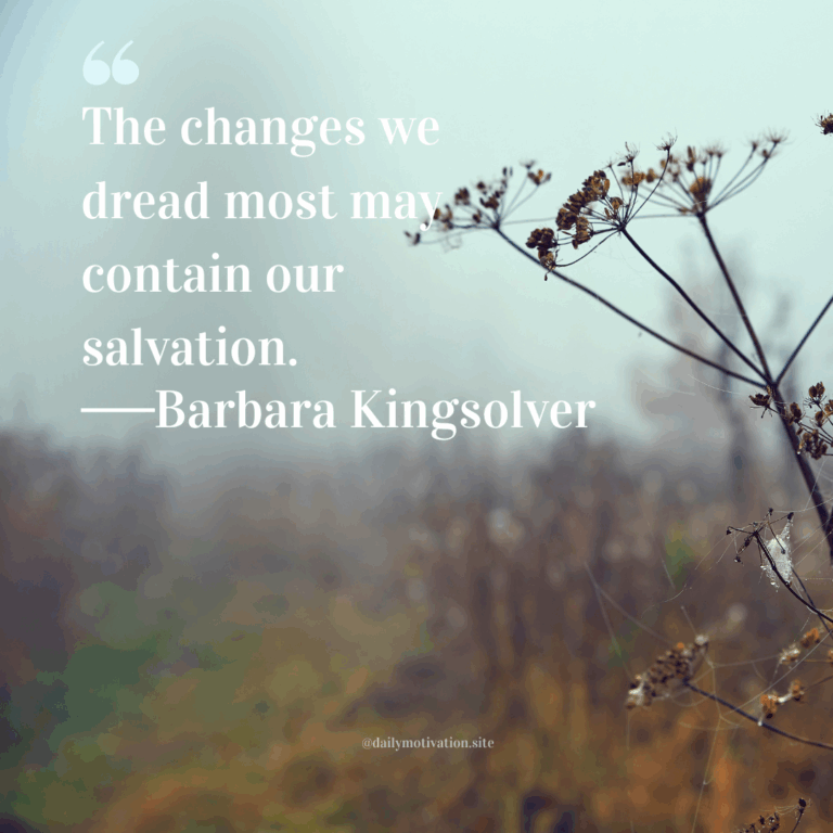 Dried wildflowers and grass in a foggy field with muted tones.